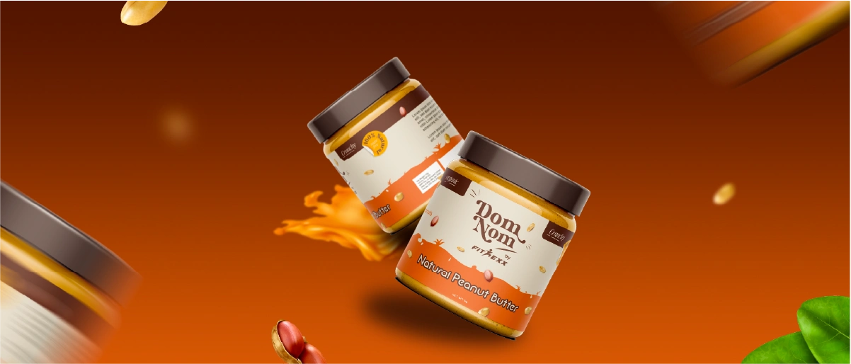 Hero showcasing branding work with two jars of peanut butter against an orange gradient background.